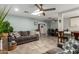 Open living room with adjacent dining area and kitchen at 4628 E Holly St, Phoenix, AZ 85008