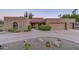 Charming desert home with two-car garage and landscaping at 25817 N Bolero Bnd, Rio Verde, AZ 85263