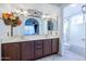 Bathroom with double vanity and a shower/tub combo at 3907 E Ironwood Dr, Phoenix, AZ 85044