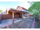 Covered patio with ceiling fans, offering shade and outdoor space at 3907 E Ironwood Dr, Phoenix, AZ 85044
