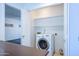 Washer and dryer in a well-lit laundry closet at 3907 E Ironwood Dr, Phoenix, AZ 85044