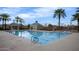 Community lap pool with surrounding palms at 3907 E Ironwood Dr, Phoenix, AZ 85044