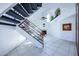 Open living area with tile floors and a staircase at 3907 E Ironwood Dr, Phoenix, AZ 85044