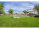 Community playground with shaded areas and picnic tables at 3907 E Ironwood Dr, Phoenix, AZ 85044