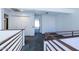 Loft hallway with carpet, doors to bedrooms and bath at 3907 E Ironwood Dr, Phoenix, AZ 85044