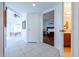 Hallway with tile flooring, leading to bedroom and bathroom at 3907 E Ironwood Dr, Phoenix, AZ 85044