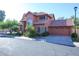 Two-story house with tile roof, attached garage, and mature trees at 3907 E Ironwood Dr, Phoenix, AZ 85044
