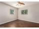 Bedroom with wood floors and ceiling fan at 2901 N Miller Rd, Scottsdale, AZ 85251