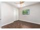 Bedroom with wood floors and a ceiling fan at 2901 N Miller Rd, Scottsdale, AZ 85251