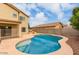 Inviting kidney shaped pool, perfect for summer at 13443 W Crocus Dr, Surprise, AZ 85379