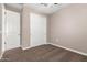 Bright bedroom featuring a ceiling fan and double door closet at 37784 W San Sisto Ave, Maricopa, AZ 85138