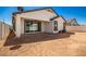 Back exterior view showing patio and landscaping at 37784 W San Sisto Ave, Maricopa, AZ 85138