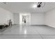Spacious garage with epoxy flooring and extra storage at 37784 W San Sisto Ave, Maricopa, AZ 85138