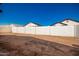 Large backyard with block wall and desert landscaping at 37784 W San Sisto Ave, Maricopa, AZ 85138