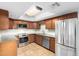 Kitchen boasts granite countertops and stainless steel appliances at 7940 E Camelback Rd # 101, Scottsdale, AZ 85251