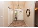 Bright and spacious entryway with tile flooring at 5960 E Grapevine Rd, Cave Creek, AZ 85331