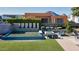 Backyard with a water feature, fire pit, and seating area at 6850 E Joshua Tree Ln, Paradise Valley, AZ 85253