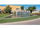 Curved water feature with multiple streams and landscaping at 6850 E Joshua Tree Ln, Paradise Valley, AZ 85253