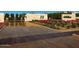 Community entrance with water feature and lush landscaping at 6850 E Joshua Tree Ln, Paradise Valley, AZ 85253