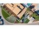 Aerial view of a luxury home with a pool and landscaped grounds at 6850 E Joshua Tree Ln, Paradise Valley, AZ 85253