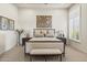 Serene bedroom with a king-size bed and a large window with plantation shutters at 10904 E Scopa Trl, Scottsdale, AZ 85262