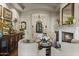 Cozy living room featuring a fireplace and comfortable seating at 10904 E Scopa Trl, Scottsdale, AZ 85262