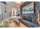 Living room with cozy stone fireplace and comfortable seating at 2449 W Sunrise Dr, Phoenix, AZ 85041