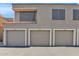 Three-car garage with individual garage doors at 5122 E Shea Blvd # 1164, Scottsdale, AZ 85254