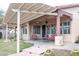 Covered patio with seating area and ceiling fan at 10683 E Saddle Blanket Trl, Gold Canyon, AZ 85118