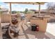 Outdoor kitchen with built-in grill and prep station at 10683 E Saddle Blanket Trl, Gold Canyon, AZ 85118