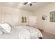 Bedroom with a queen-size bed and access to another room at 13846 W Figueroa Dr, Sun City West, AZ 85375