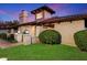 View of the home's exterior, showcasing the architectural details and landscaping at 3181 E Berridge Ln, Phoenix, AZ 85016