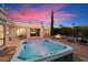 Relaxing hot tub on a spacious patio with sunset views at 3181 E Berridge Ln, Phoenix, AZ 85016