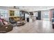 Open kitchen with island, dark cabinetry, and tiled floors at 4707 S Avitus Ln, Mesa, AZ 85212