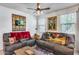 Cozy living room featuring two leather couches and a wood coffee table at 4707 S Avitus Ln, Mesa, AZ 85212