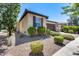 Single story home with a two car garage and manicured landscaping at 4707 S Avitus Ln, Mesa, AZ 85212