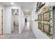Clean hallway with tile floors leading to other rooms at 4707 S Avitus Ln, Mesa, AZ 85212