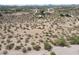 Aerial view of property showcasing expansive desert landscape at 1880 W Roderick Ln, Wickenburg, AZ 85390