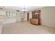 Kitchen dining area with tile floor and built-in hutch at 12807 W Mesa Verde Dr, Sun City West, AZ 85375