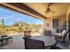 Spacious patio with seating area and golf course views at 18364 N Diamond Dr, Surprise, AZ 85374