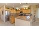 Modern kitchen boasting stainless steel appliances and ample cabinet space at 18364 N Diamond Dr, Surprise, AZ 85374