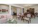 Open concept living room with views to entryway and dining room at 18364 N Diamond Dr, Surprise, AZ 85374