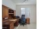 Home office with built-in desk and cabinets, perfect for working from home at 18364 N Diamond Dr, Surprise, AZ 85374