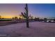 Sunset view of golf course with tall cactus in foreground at 18364 N Diamond Dr, Surprise, AZ 85374