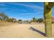 Scenic view of a golf course with a lake at 18364 N Diamond Dr, Surprise, AZ 85374