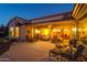 Evening view of patio with seating area and interior view at 18364 N Diamond Dr, Surprise, AZ 85374