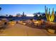 Fire pit and seating area on the patio, ideal for evening gatherings at 18364 N Diamond Dr, Surprise, AZ 85374