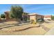 House exterior with desert landscaping and stone accents at 18364 N Diamond Dr, Surprise, AZ 85374