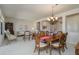 Bright dining room with view to the living room and entryway at 18364 N Diamond Dr, Surprise, AZ 85374