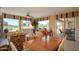 Charming dining area with view to the backyard and golf course at 18364 N Diamond Dr, Surprise, AZ 85374